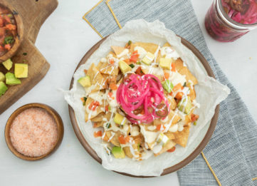 Creamy Cheese Nachos with Pickled Peppers and Onions